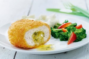 Chicken Kiev with fluffy mash and smashed mixed vegetables 